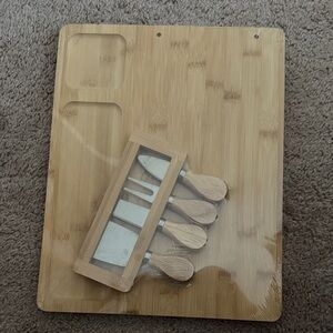 Cheese board with knives